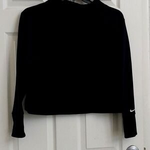 A black Nike sweatshirt. Size XS